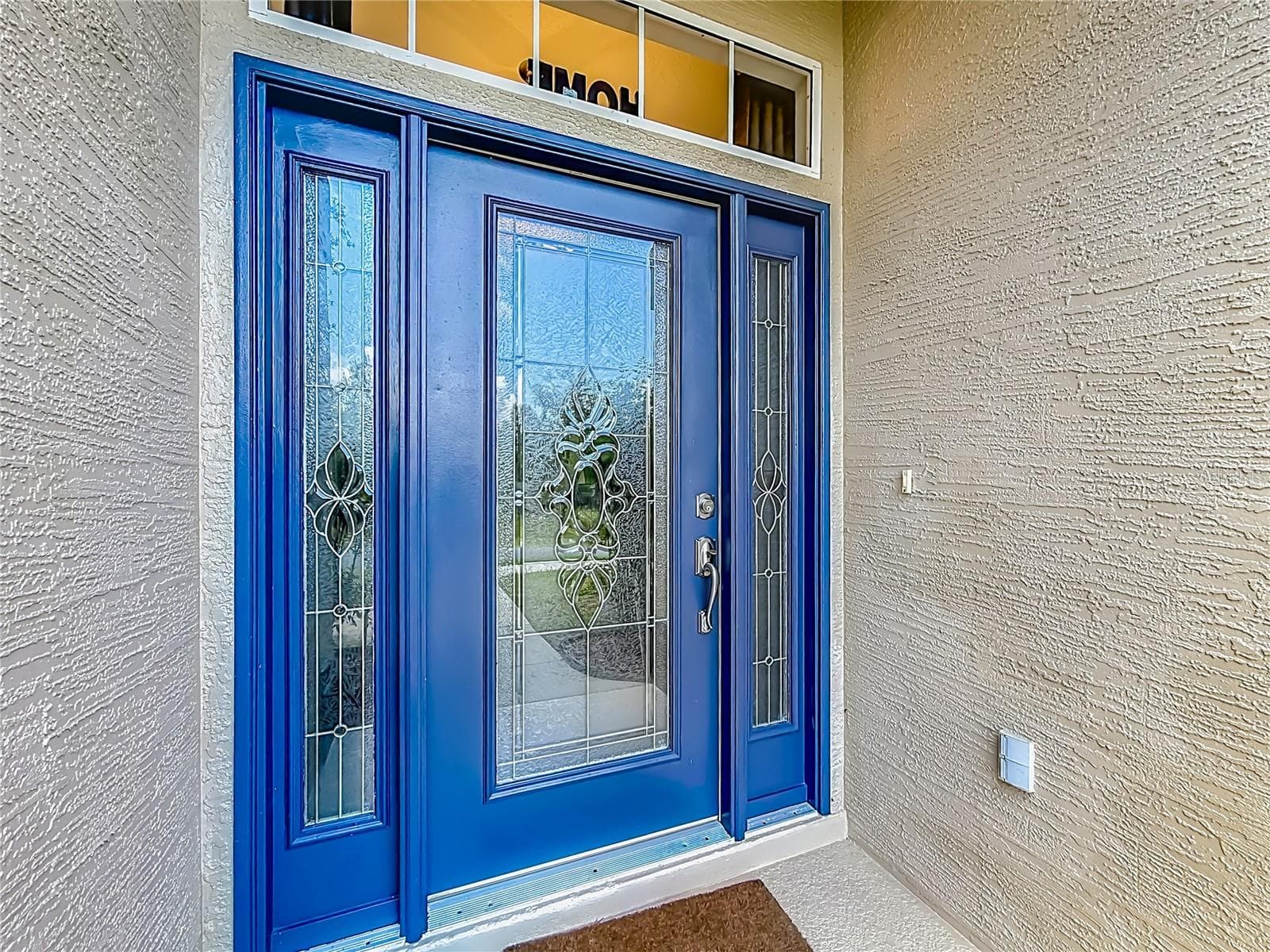 Striking blue double front doors with decorative glass - 2452 W ARBUTUS DR, CITRUS SPRINGS