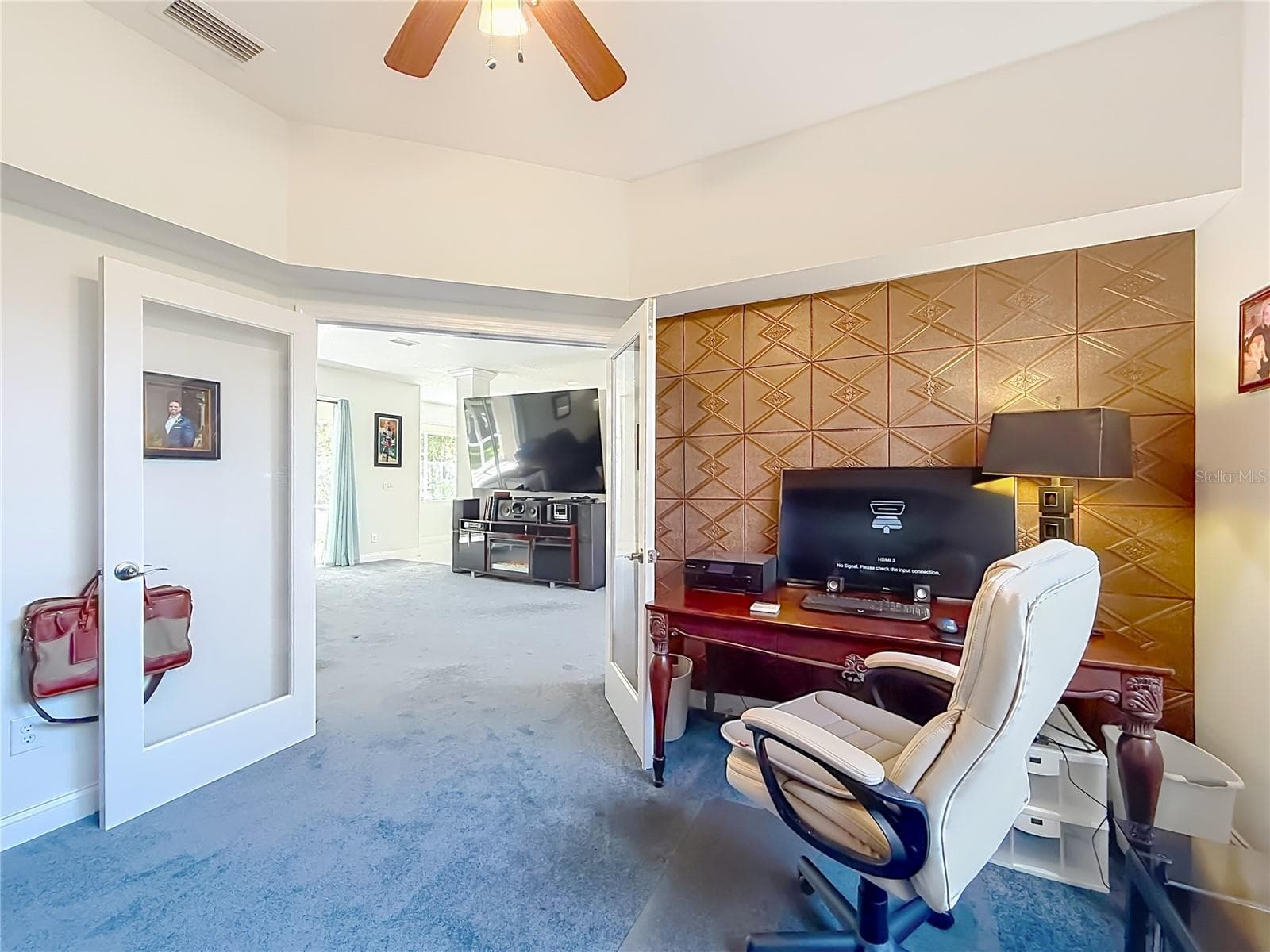 Home office/den with accent wall, perfect for working from home - 2452 W ARBUTUS DR, CITRUS SPRINGS