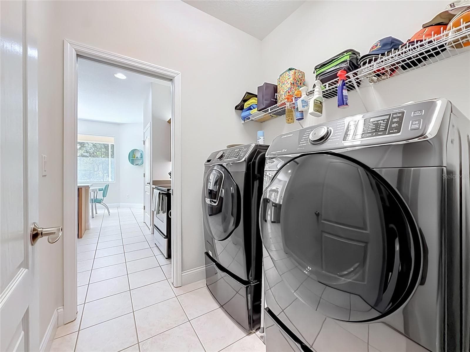 Indoor laundry room with front-load washer and dryer - 2452 W ARBUTUS DR, CITRUS SPRINGS