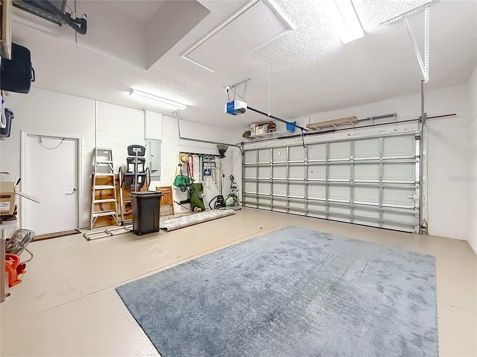 Oversized garage with storage shelving - 2452 W ARBUTUS DR, CITRUS SPRINGS