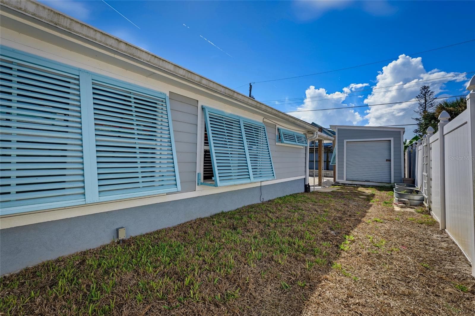 WEST SIDE OF HOME - 118 ROBERTA RD, ORMOND BEACH