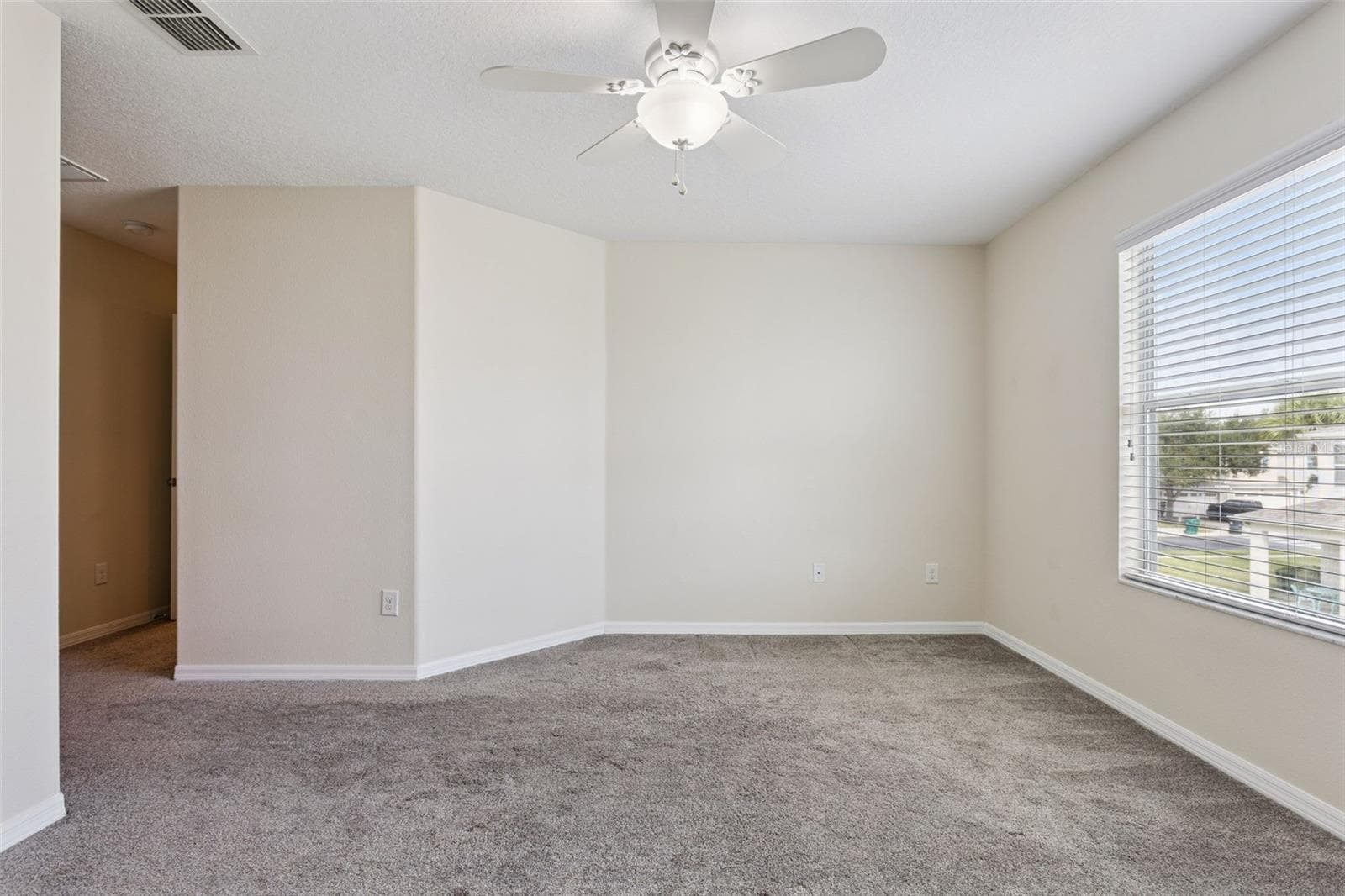Primary bedrooom facing hall to ensuite bathroom - 15515 CAMPDEN ST, WINTER GARDEN