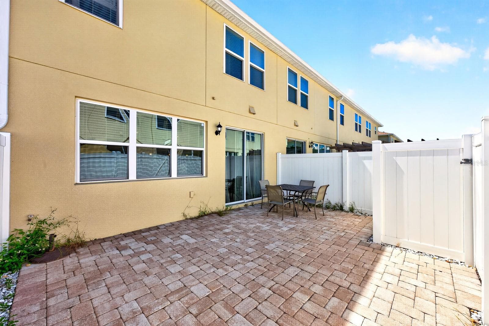 Large privacy fenced paver patio. - 5109 KILLARNEY WAY, KISSIMMEE