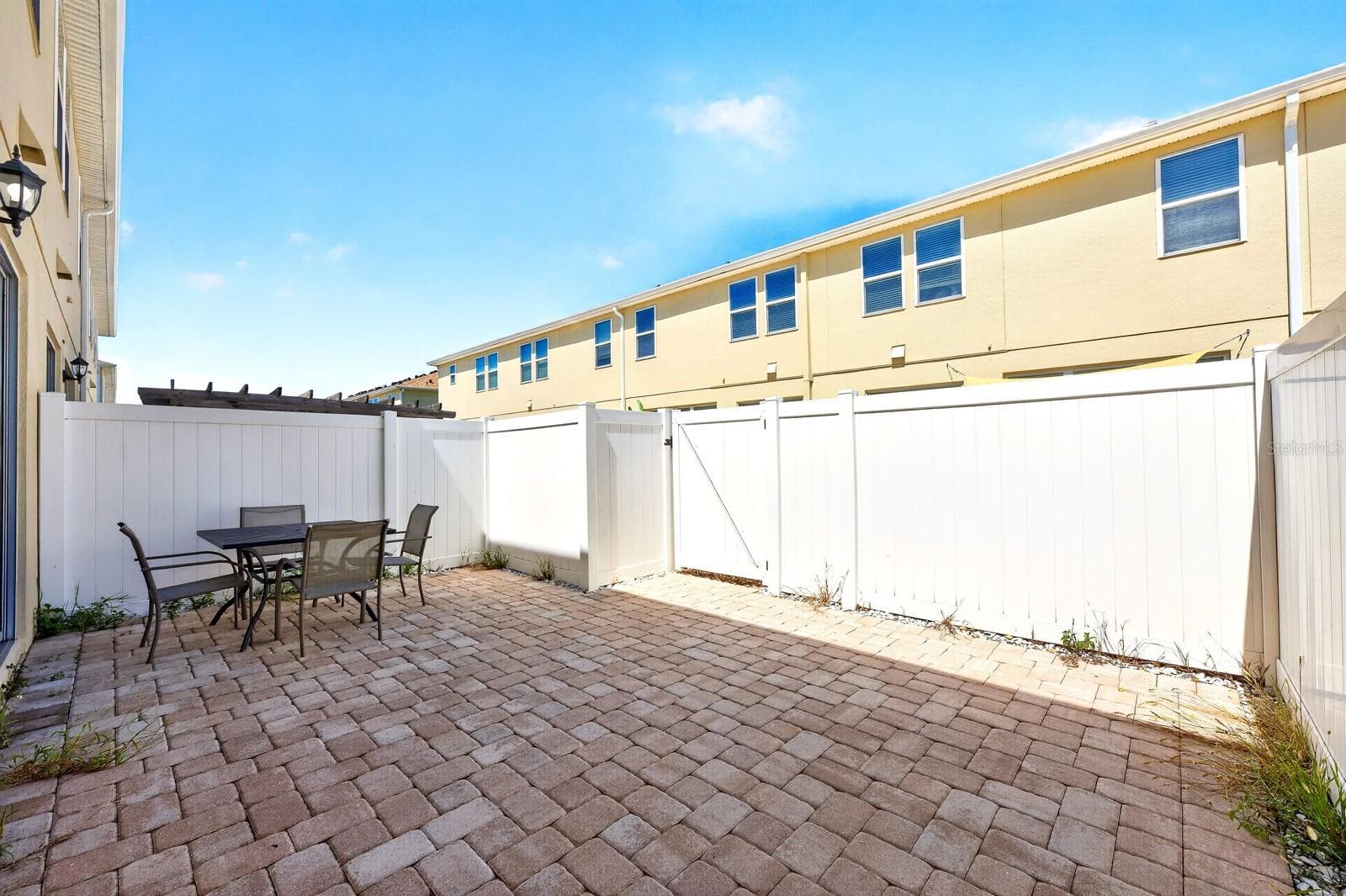 Large privacy fenced paver patio. - 5109 KILLARNEY WAY, KISSIMMEE