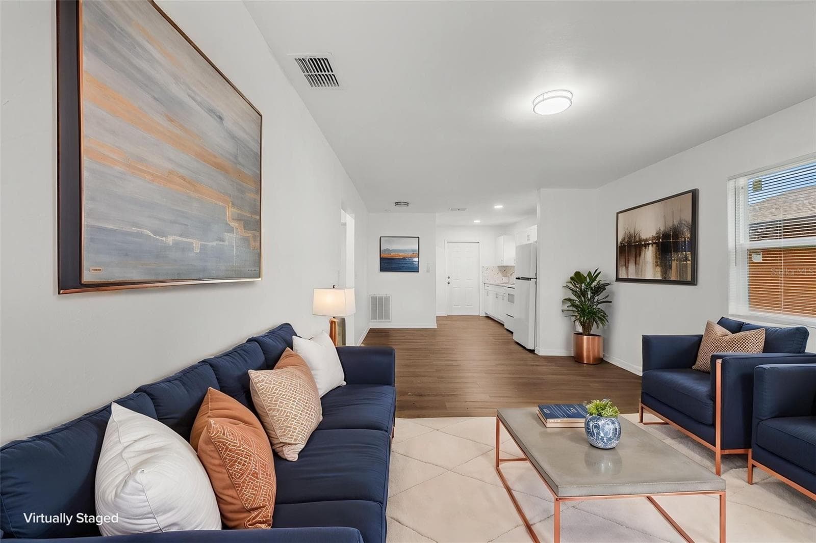 virtual stage living room - 825 BOOKER AVE, SEBRING