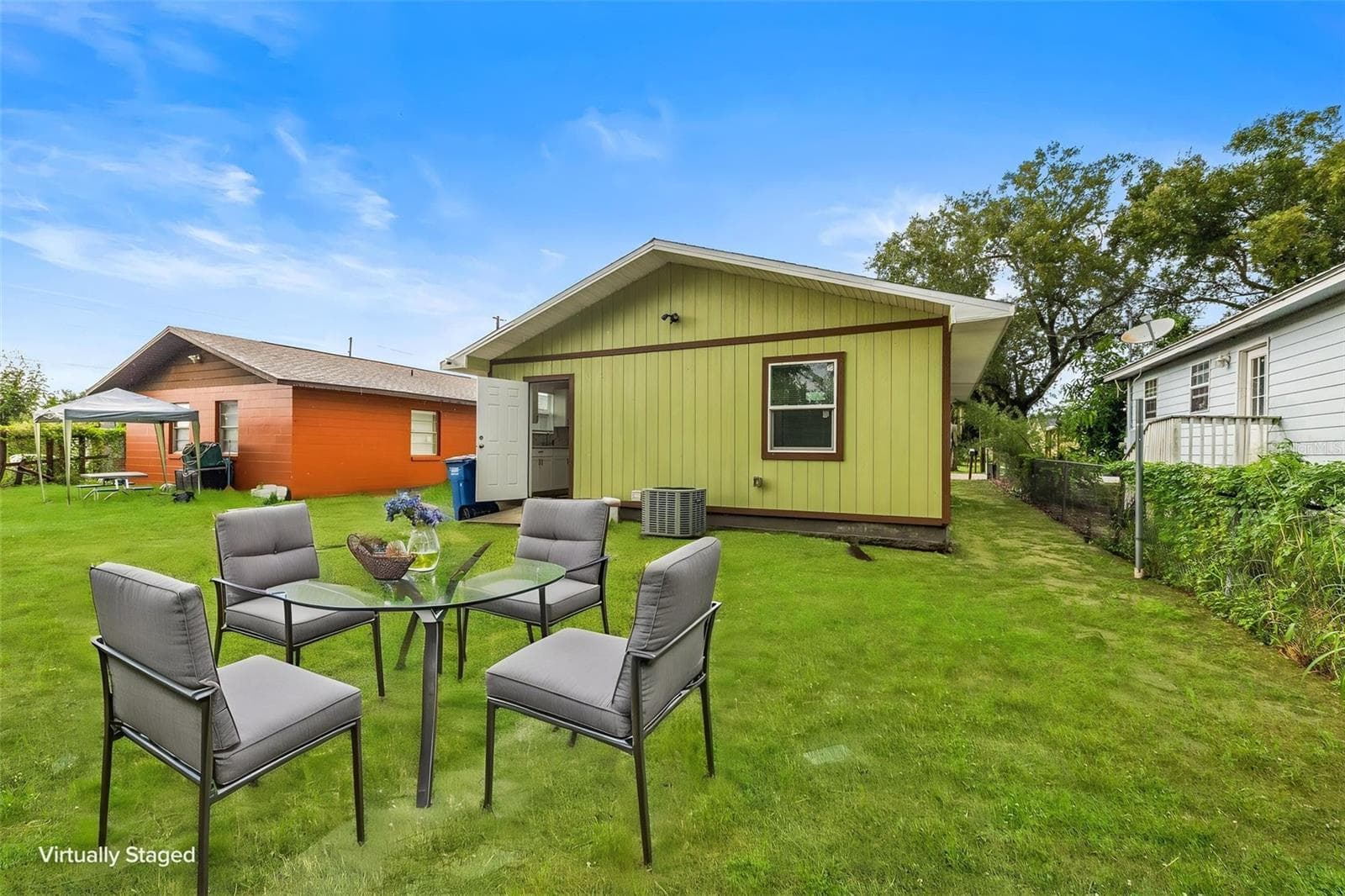 virtual stage backyard - 825 BOOKER AVE, SEBRING