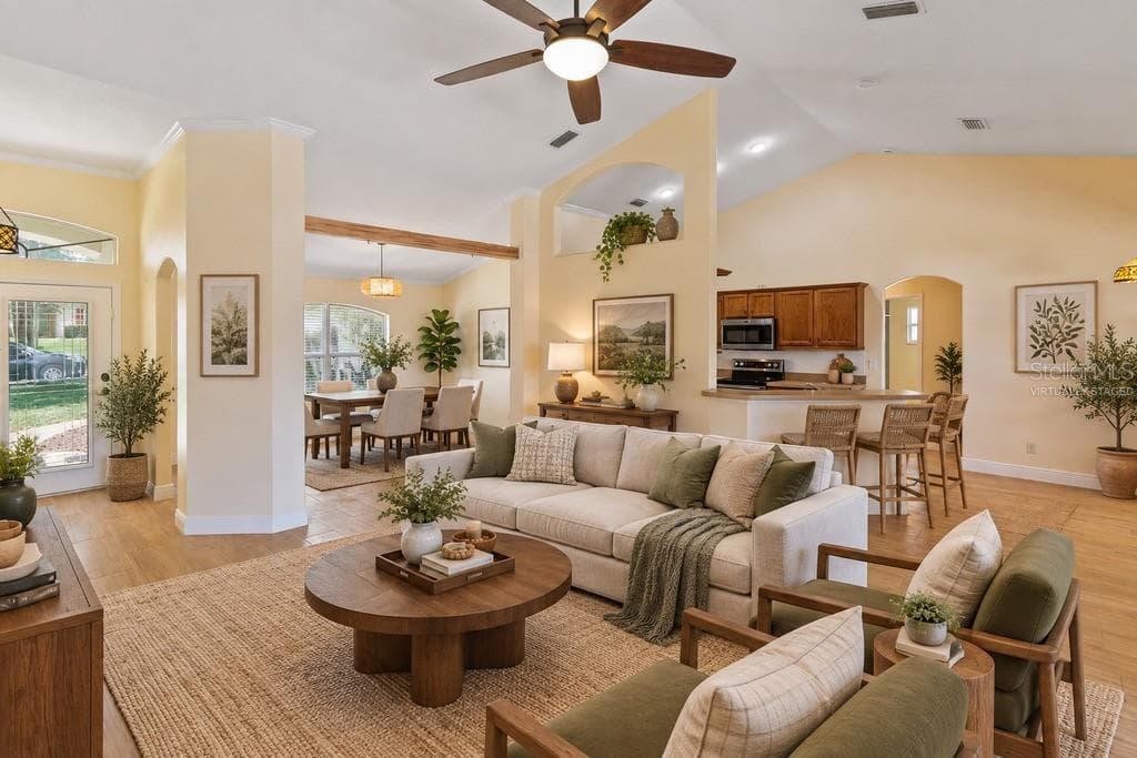 Virtually Staged - View of living, dining, kitchen from living - 10814 VINEYARD CT, CLERMONT