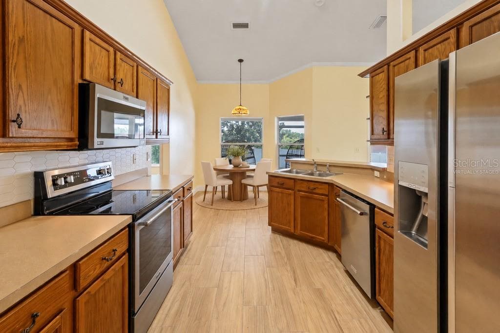 Virtually Staged - Kitchen and dinette - 10814 VINEYARD CT, CLERMONT