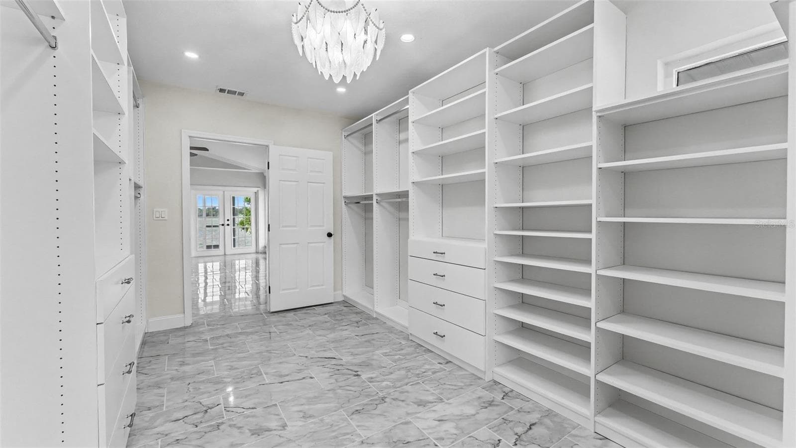 Primary Bedroom Custom Closet - 5934 PIER PLACE DR, LAKELAND