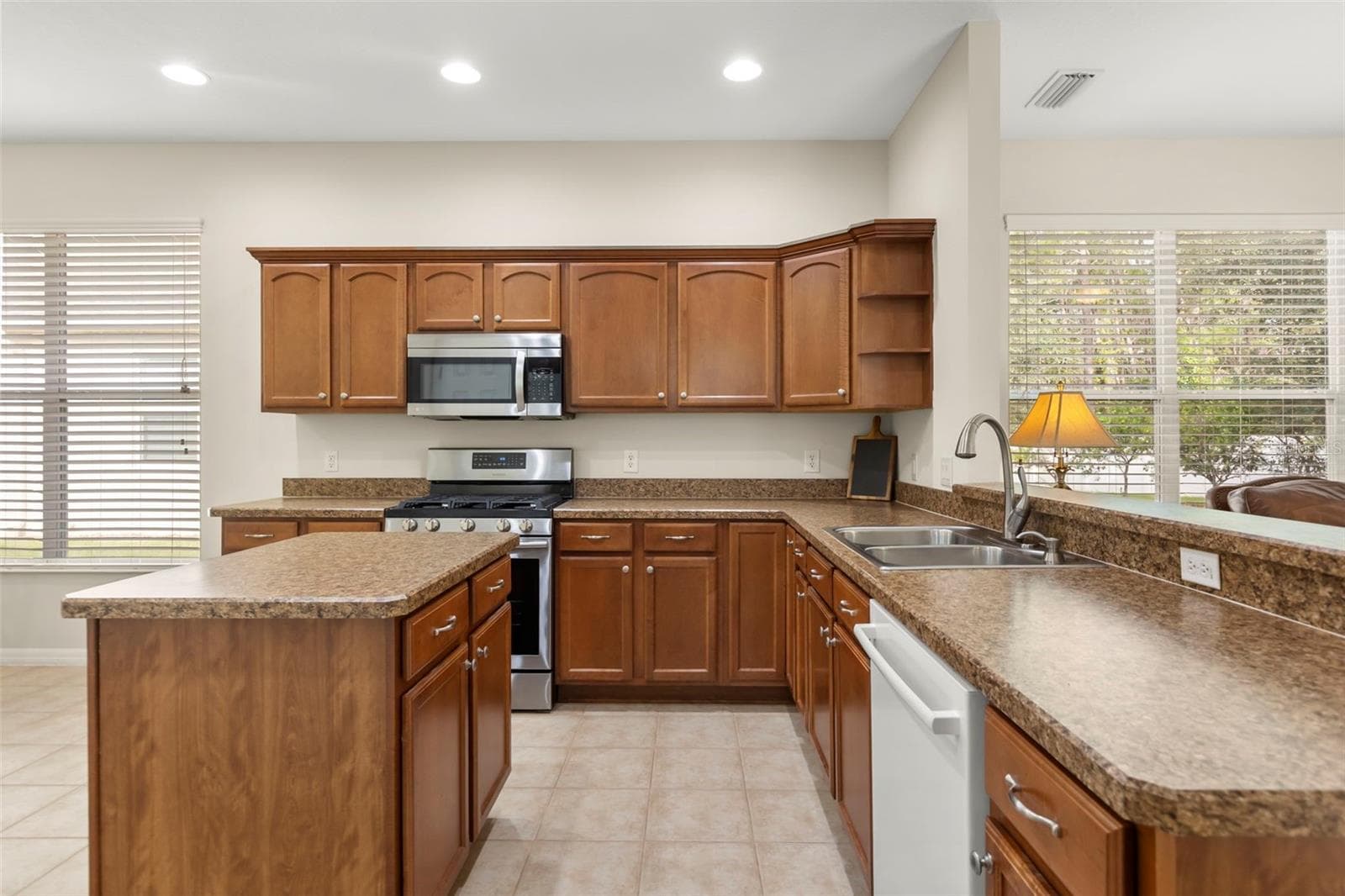 Spacious Kitchen with Center Island and Ample Cabinetry - 4711 HERITAGE TRL, LEESBURG