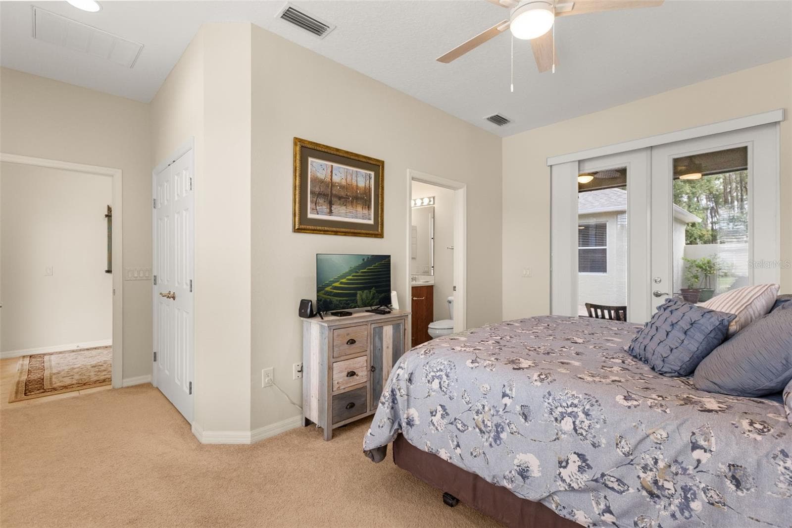 Second Bedroom with Ensuite Bath and Lanai Access - 4711 HERITAGE TRL, LEESBURG