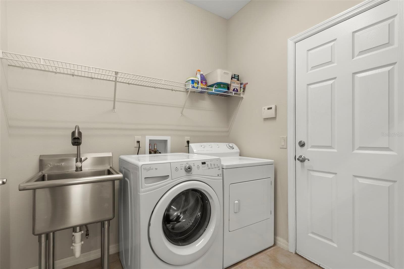 Laundry Room with Utility Sink and Storage - 4711 HERITAGE TRL, LEESBURG