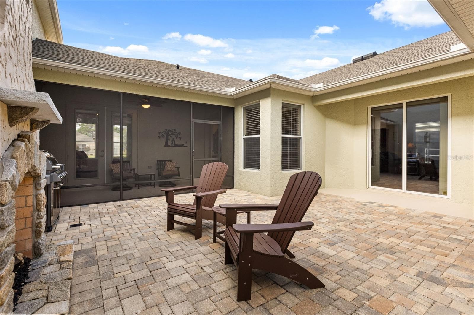 Private Paver Courtyard with Gas Fireplace and Screened Lanai - 4711 HERITAGE TRL, LEESBURG
