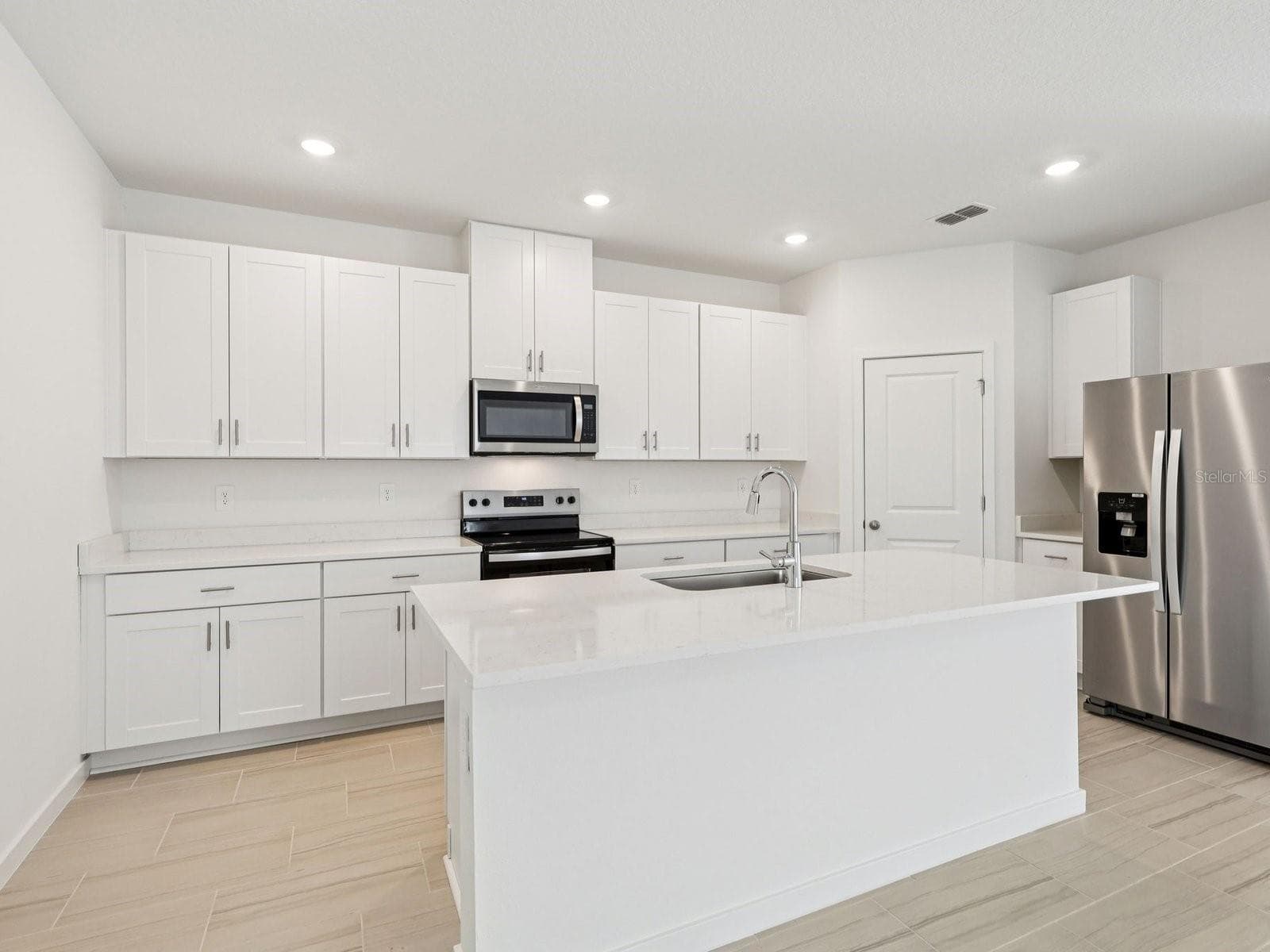 Photo is not of the actual home, but is an inspirational photo of builder’s model home and may depict options, furnishings, and/or decorator features that are not included - 124 WANDERING CREEK WAY, PALM COAST