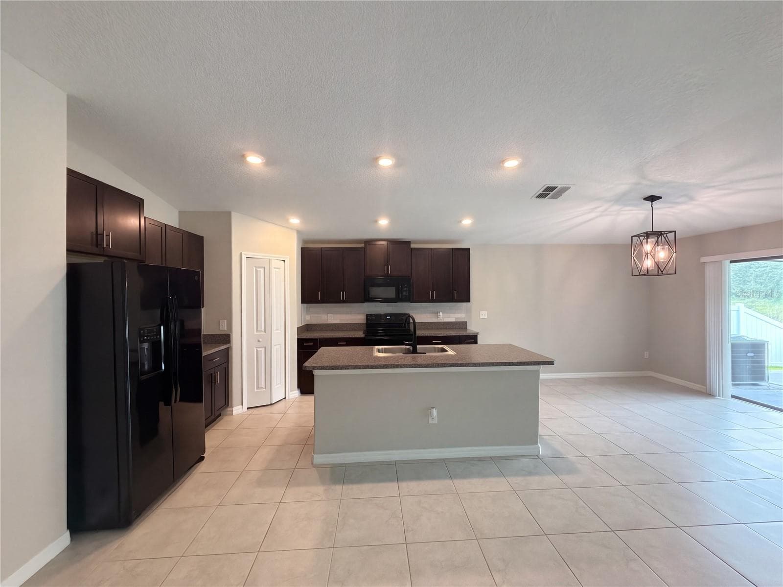 Single Family Residence at 39938 HARMON GROVE CT, ZEPHYRHILLS, photo 9 of 37