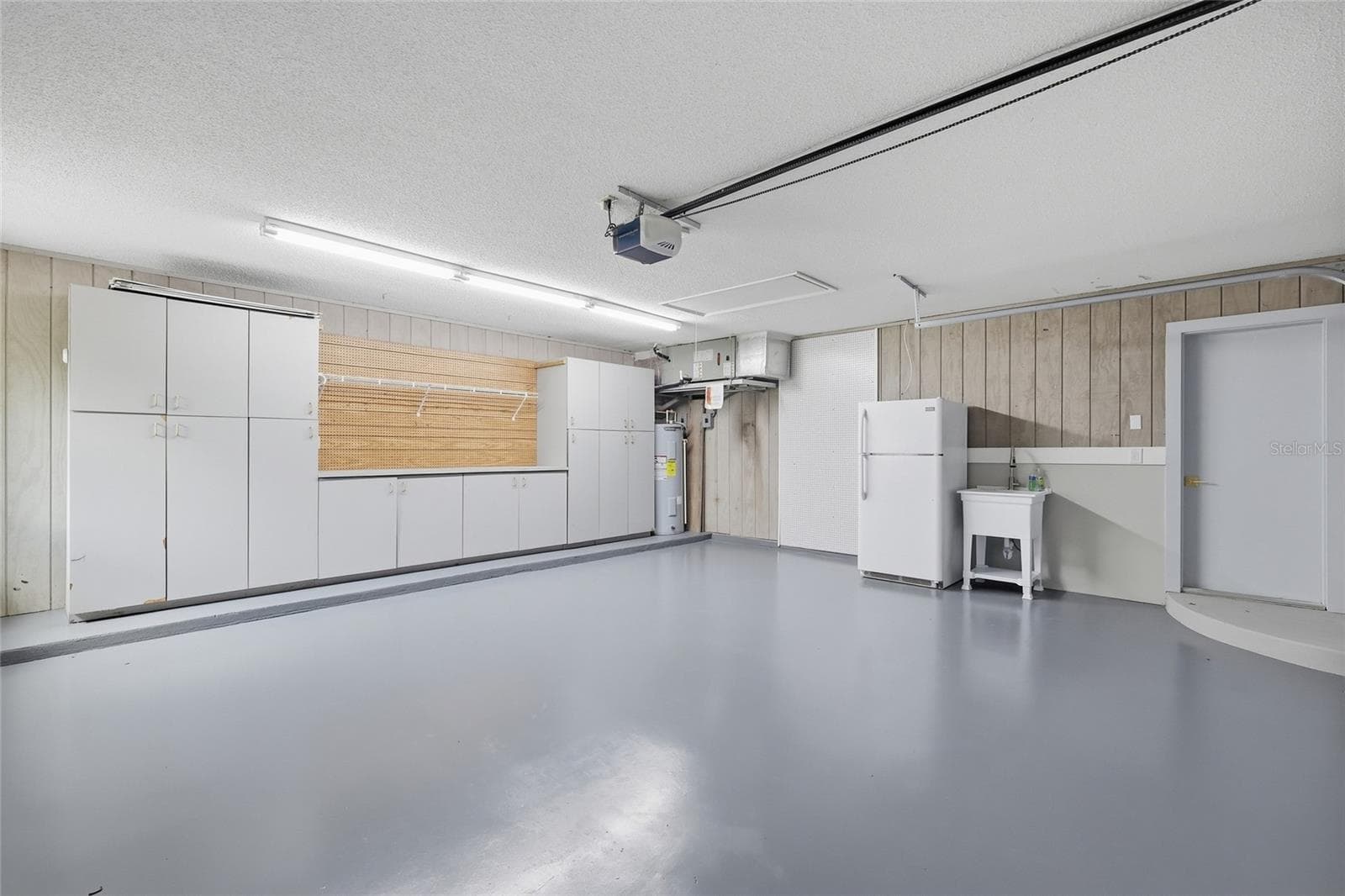 Oversized Garage with built in shelving/workshop - 1411 70TH ST NW, BRADENTON