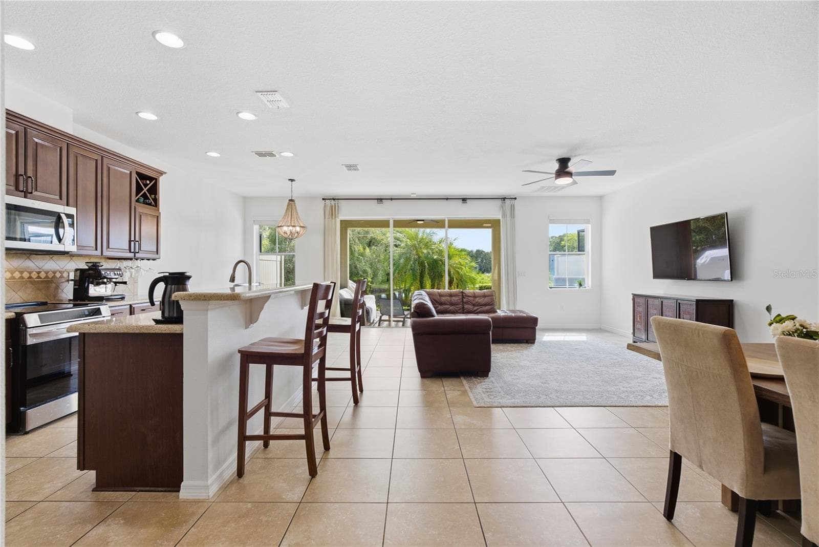 Living and dining area - 11722 CASA LAGO LN, TAMPA
