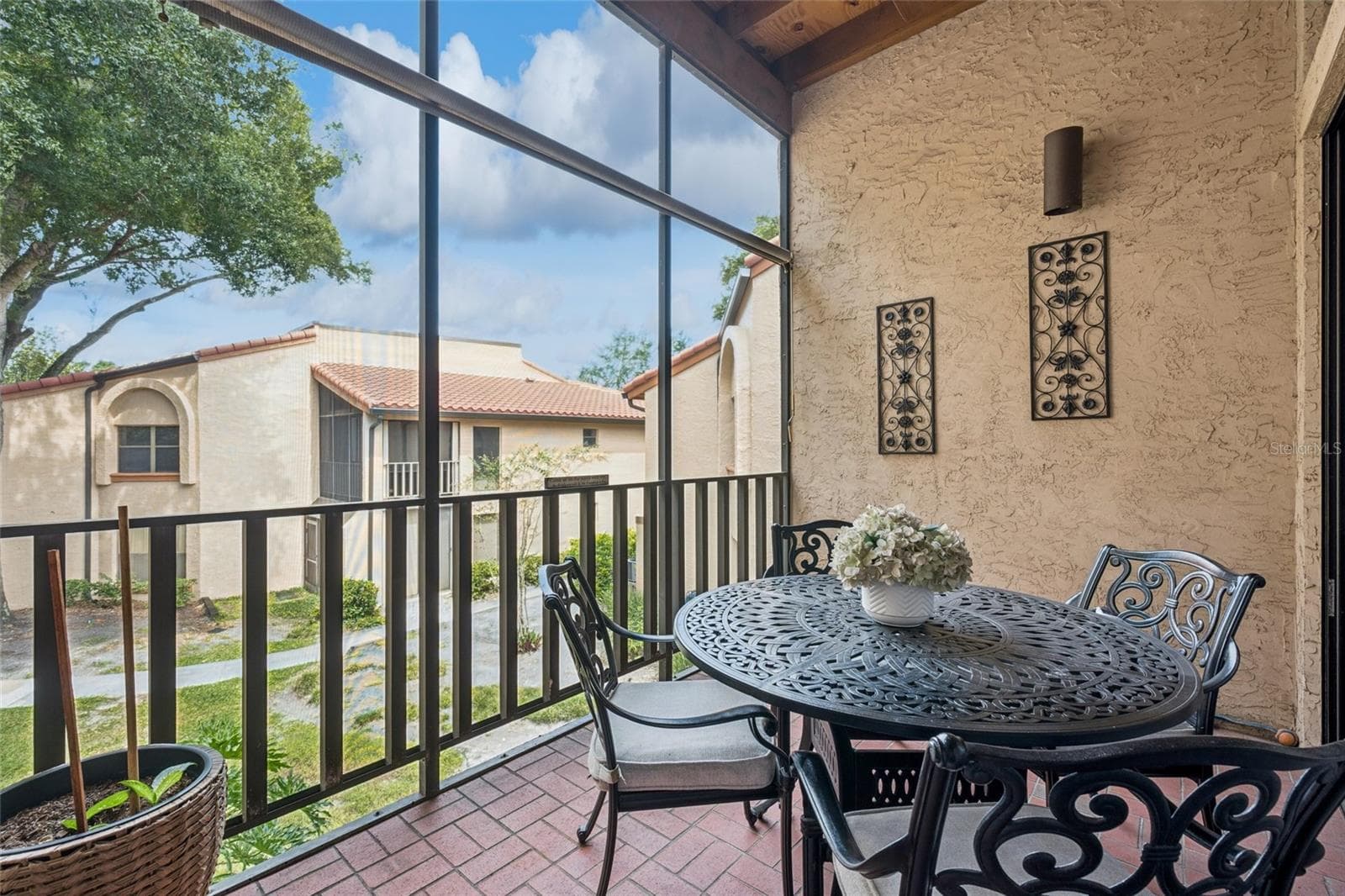 Screened-in back porch - 1266 SAINT TROPEZ CIR #1266, ORLANDO