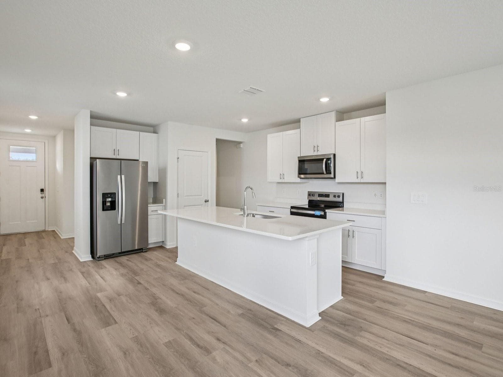 Photo is not of the actual home, but is an inspirational photo of builder’s model home and may depict options, furnishings, and/or decorator features that are not included - 7910 LAKE POWELL PL, PARRISH