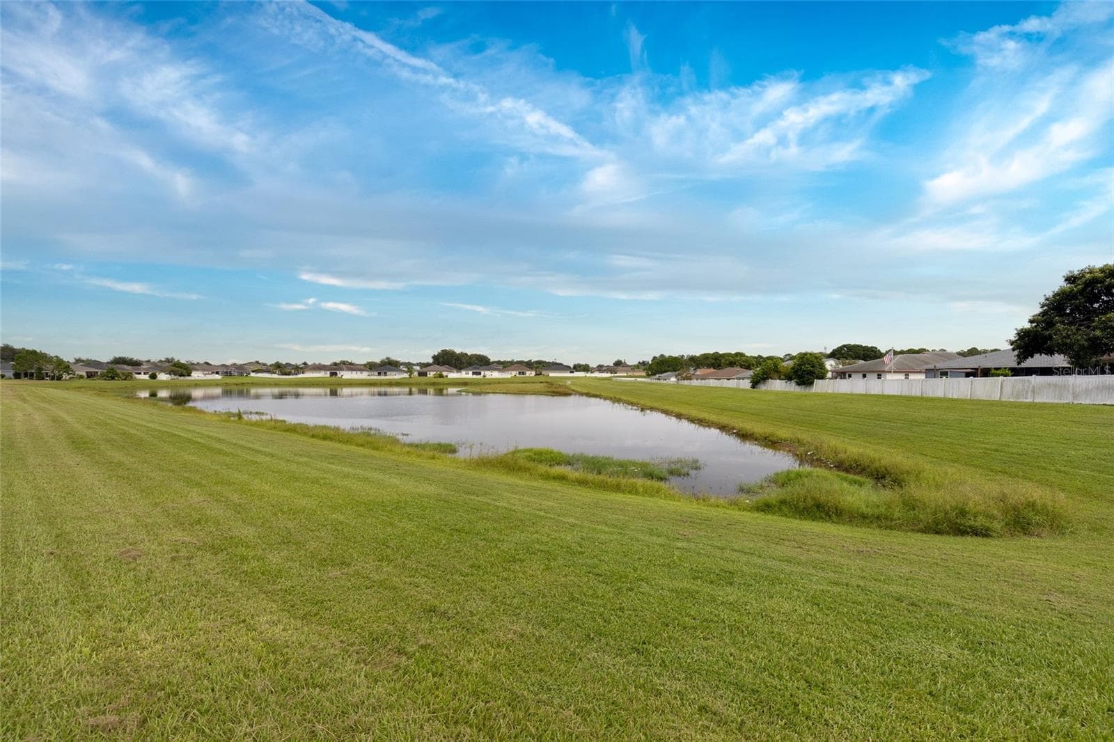 View Of Backyard Pond & Beautiful Skyview - 3652 MADBURY CIR, LAKELAND