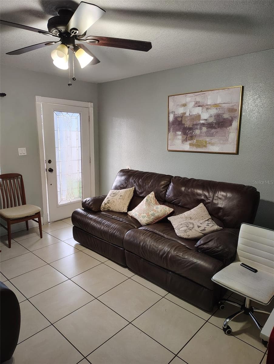 LIVING ROOM FROM INSIDE - 6913 BLOSSOM AVE, TAMPA