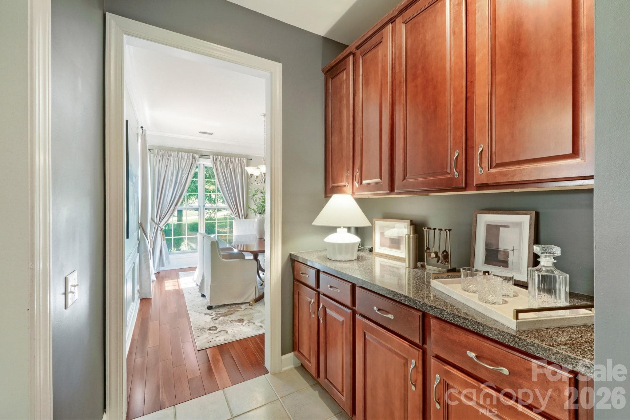 Butlers pantry between Kitchen and dining room - 10808 Pomerane Place, Charlotte