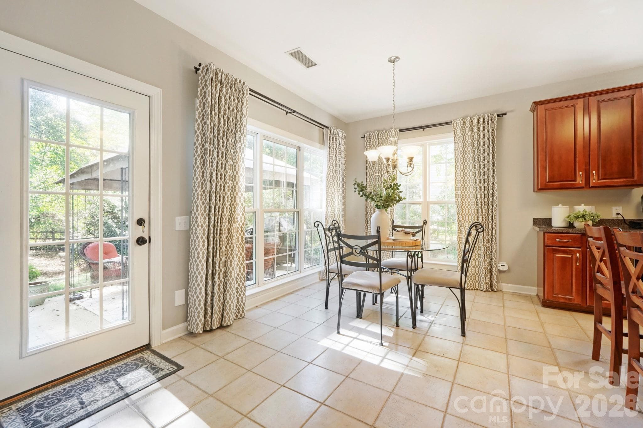 Casual dining area with gorgeous view - 10808 Pomerane Place, Charlotte