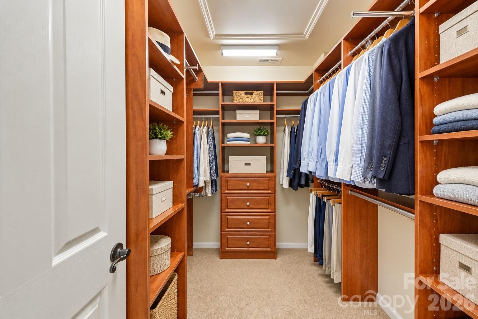 Bulit-ins in Primary walk-in closet - 10808 Pomerane Place, Charlotte
