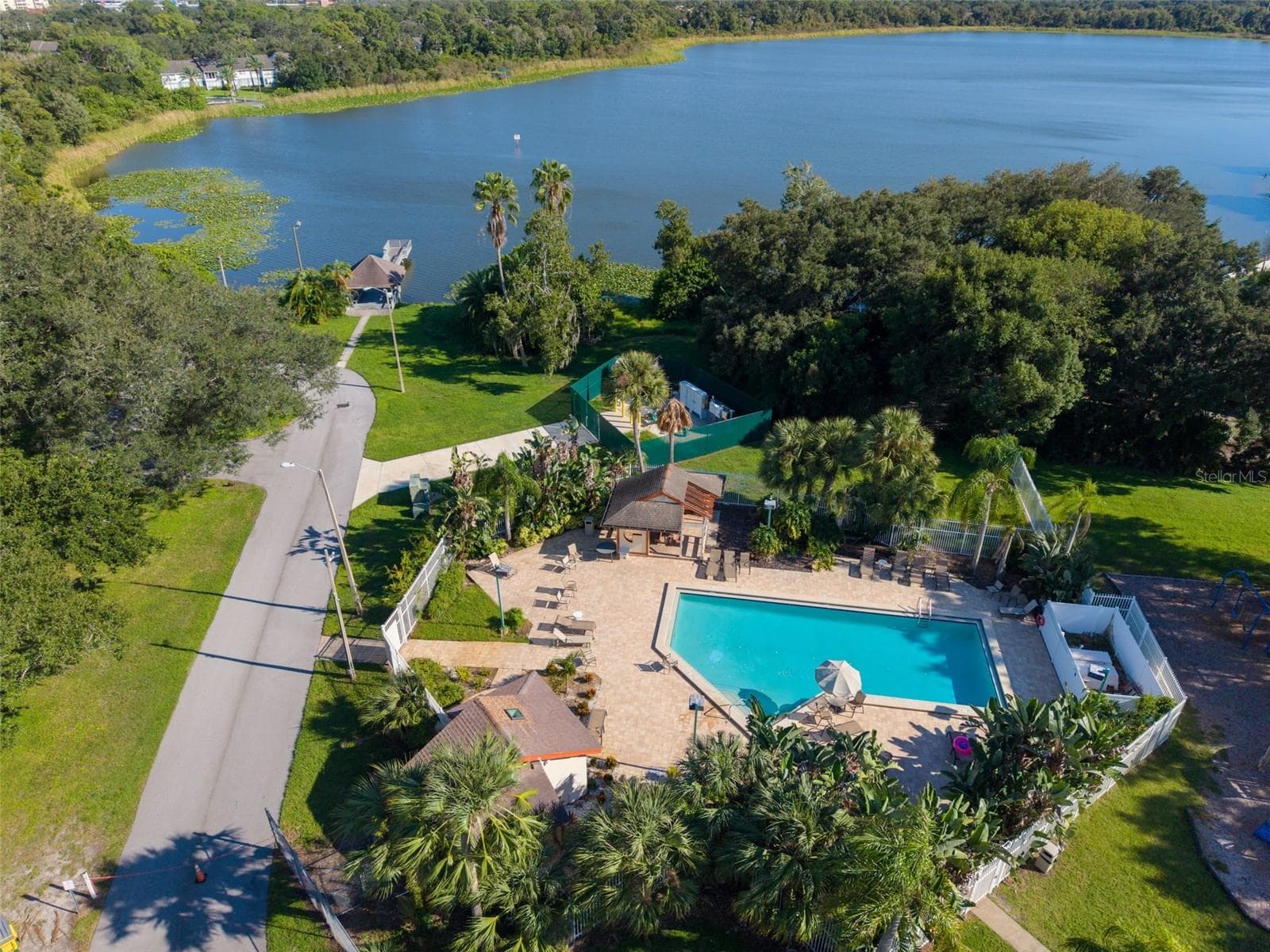 Lake St George Community swimming pool, tennis courts, basketball courts, playground, water access and dock. - 3992 ORCHARD HILL CIR, PALM HARBOR