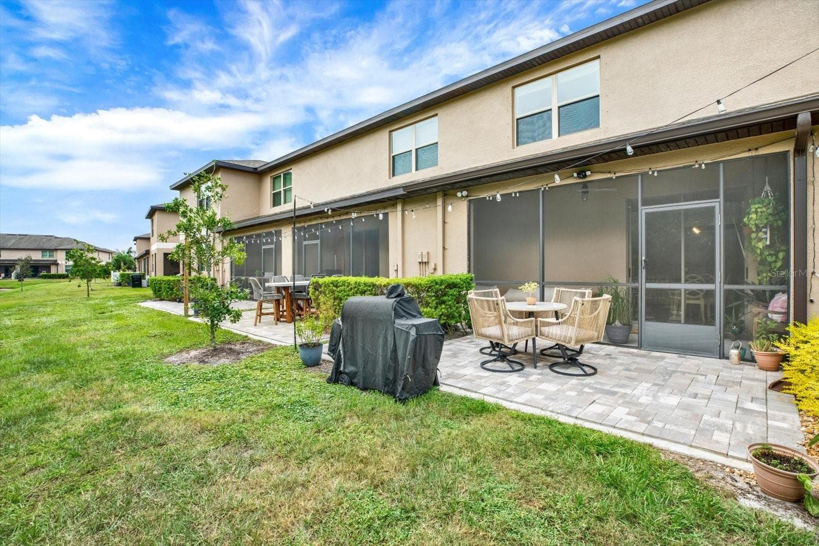 Rear screened lanai and paver patio - 8538 REEDVILLE ST, NEW PORT RICHEY