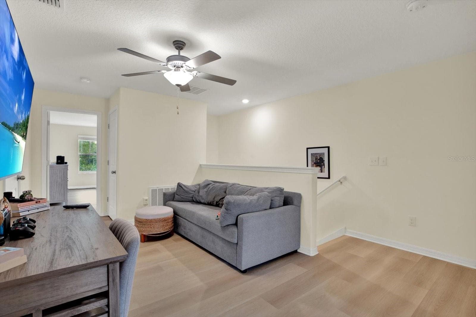 Upstairs loft area - Luxury Vinyl plank flooring - 8538 REEDVILLE ST, NEW PORT RICHEY