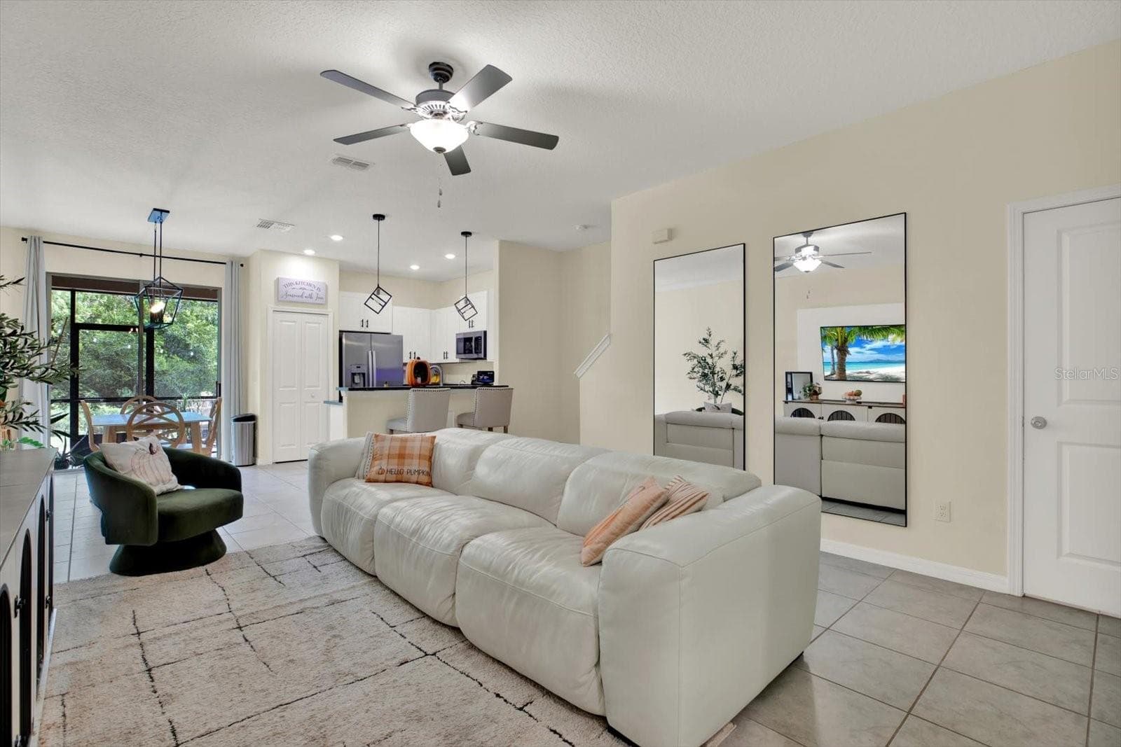 Living room open to the kitchen and dining area - 8538 REEDVILLE ST, NEW PORT RICHEY