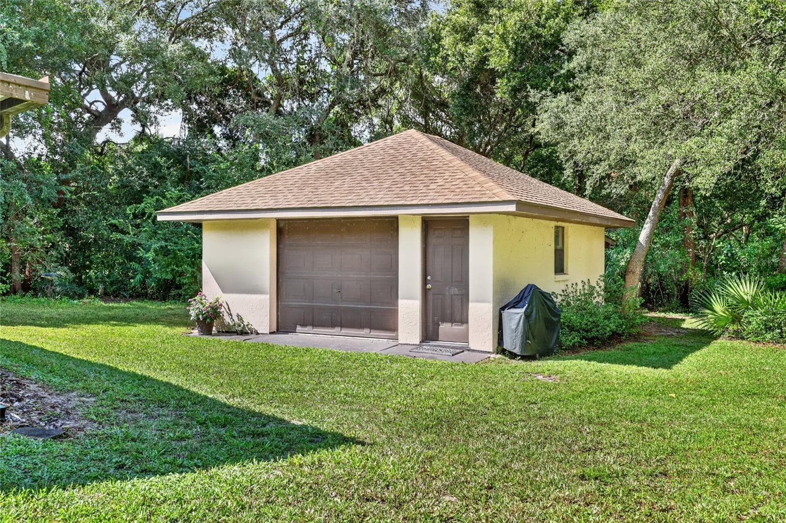 Accessory Building with inside parking for one vehicle plus lots of storage and workshop space. - 3450 SW 52ND TER, OCALA