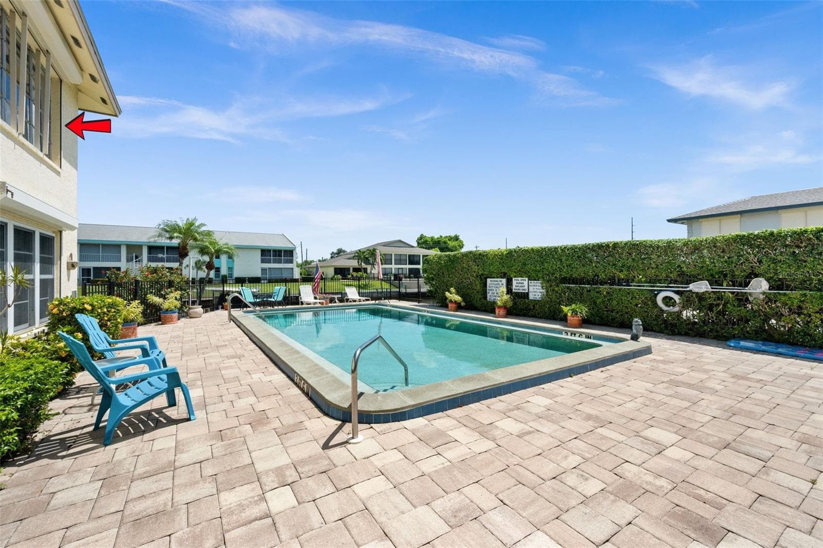 Overlooking the pool - 1345 SE 40TH TER #2E, CAPE CORAL