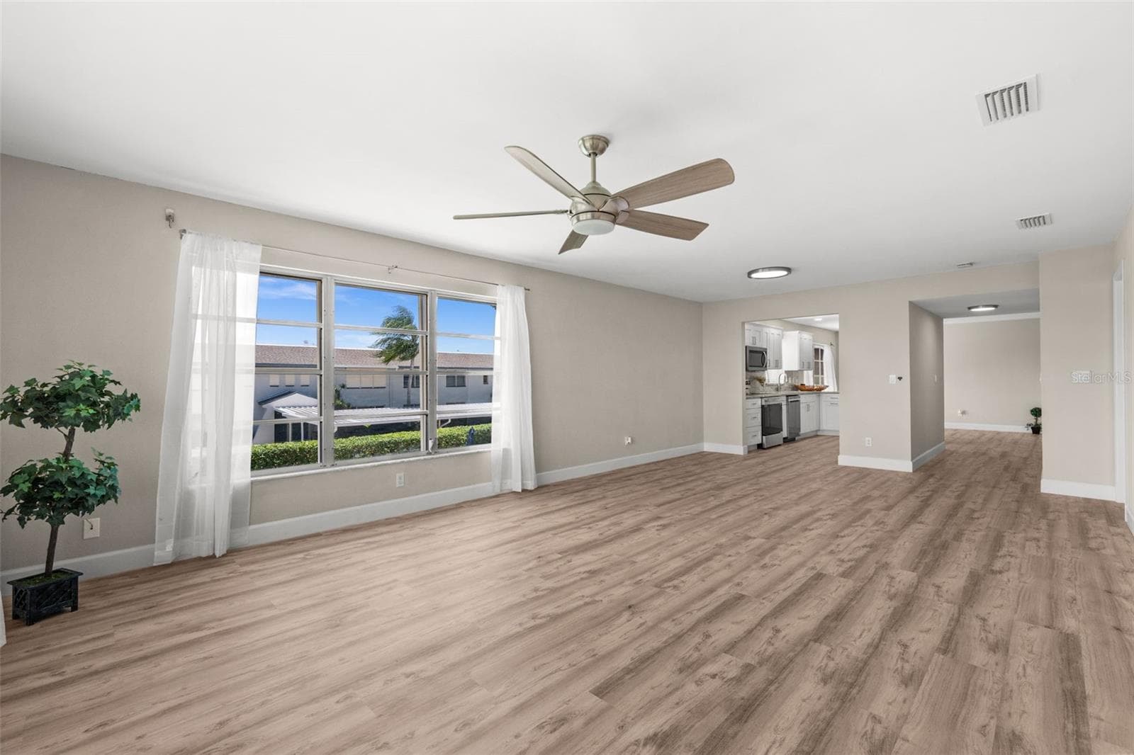 Living Room also overlooks the pool - 1345 SE 40TH TER #2E, CAPE CORAL