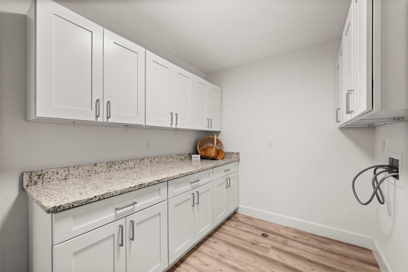 Big Laundry Room with lots of cabinets and storage - 1345 SE 40TH TER #2E, CAPE CORAL