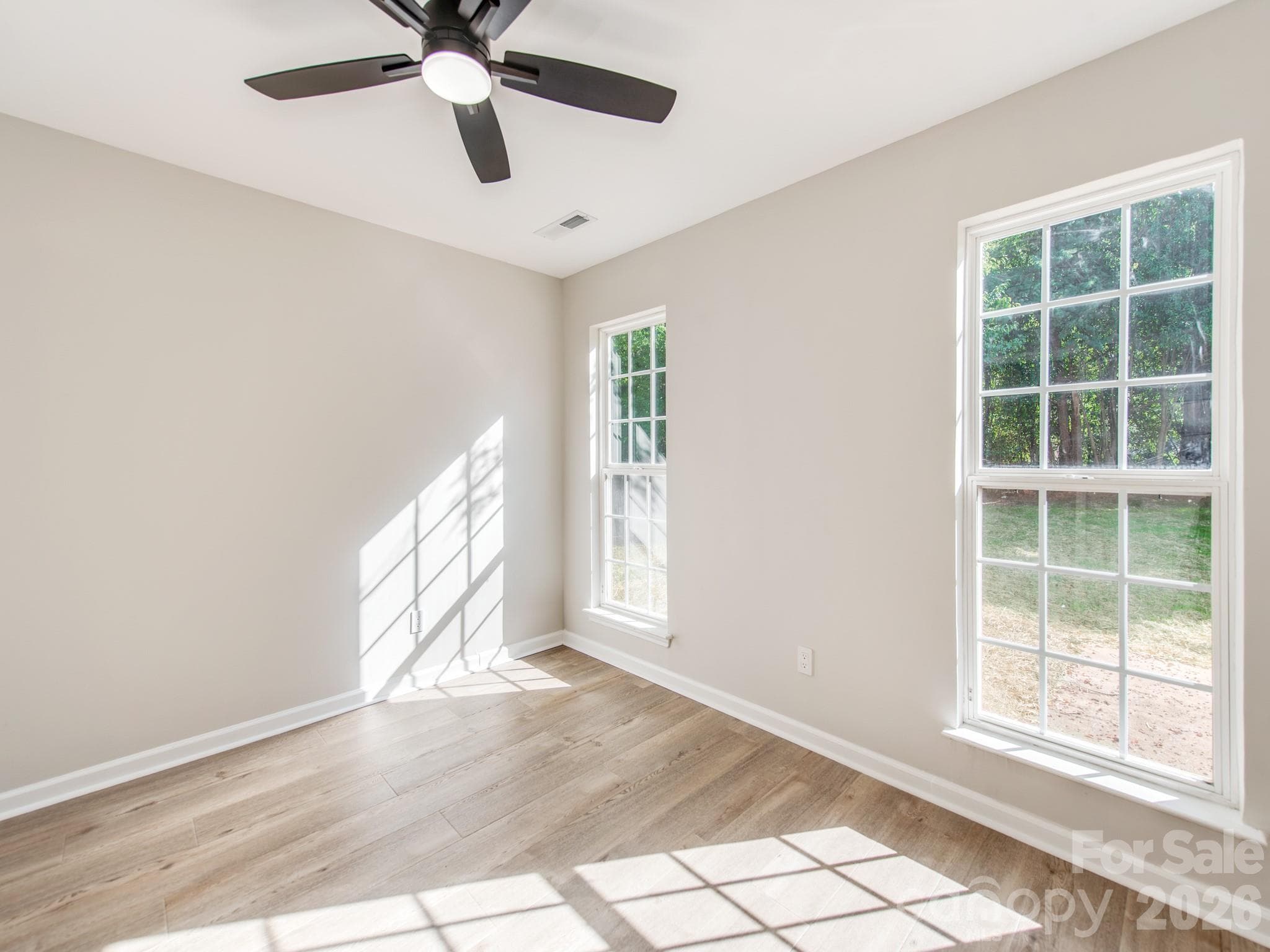Back bedroom with 2 large windows. - 810 Greenhill Drive, Charlotte