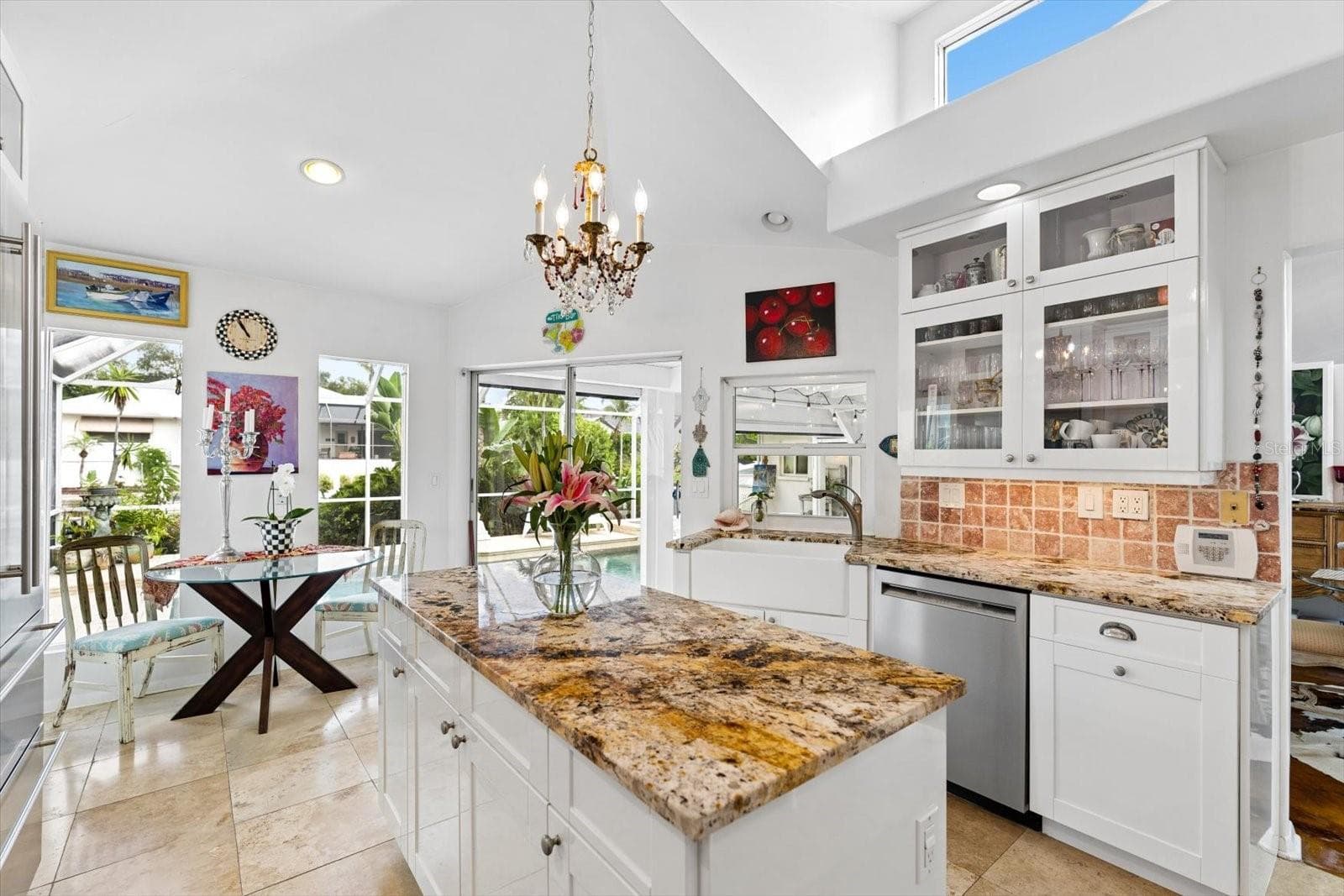 Kitchen w/ views of the pool and canal. - 1741 STANFORD LN, SARASOTA