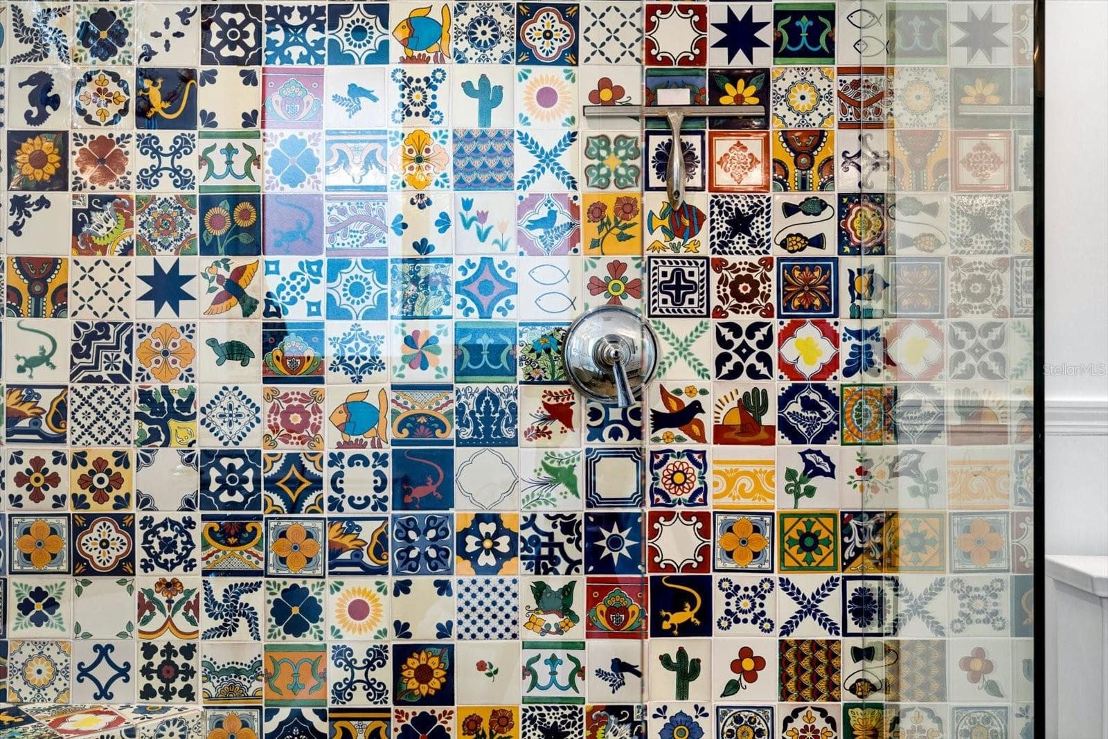 Primary Bedroom Walk-in Shower with worldly tiles - 1741 STANFORD LN, SARASOTA