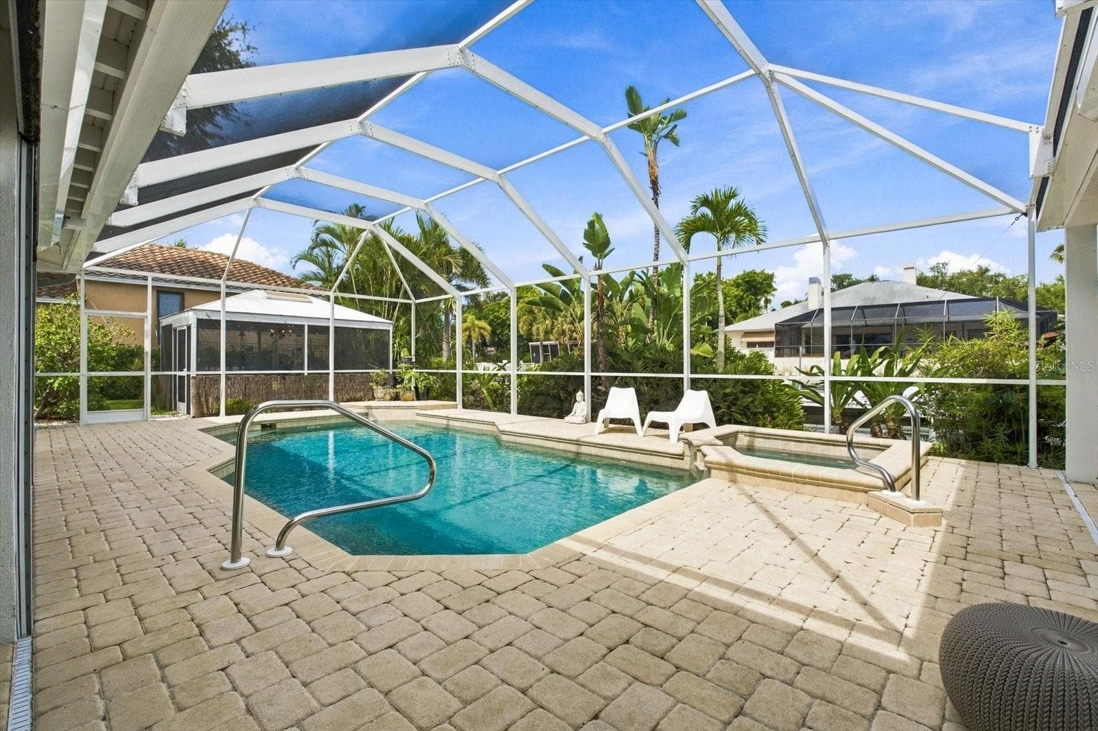 Paver pool deck with views of the canal - 1741 STANFORD LN, SARASOTA