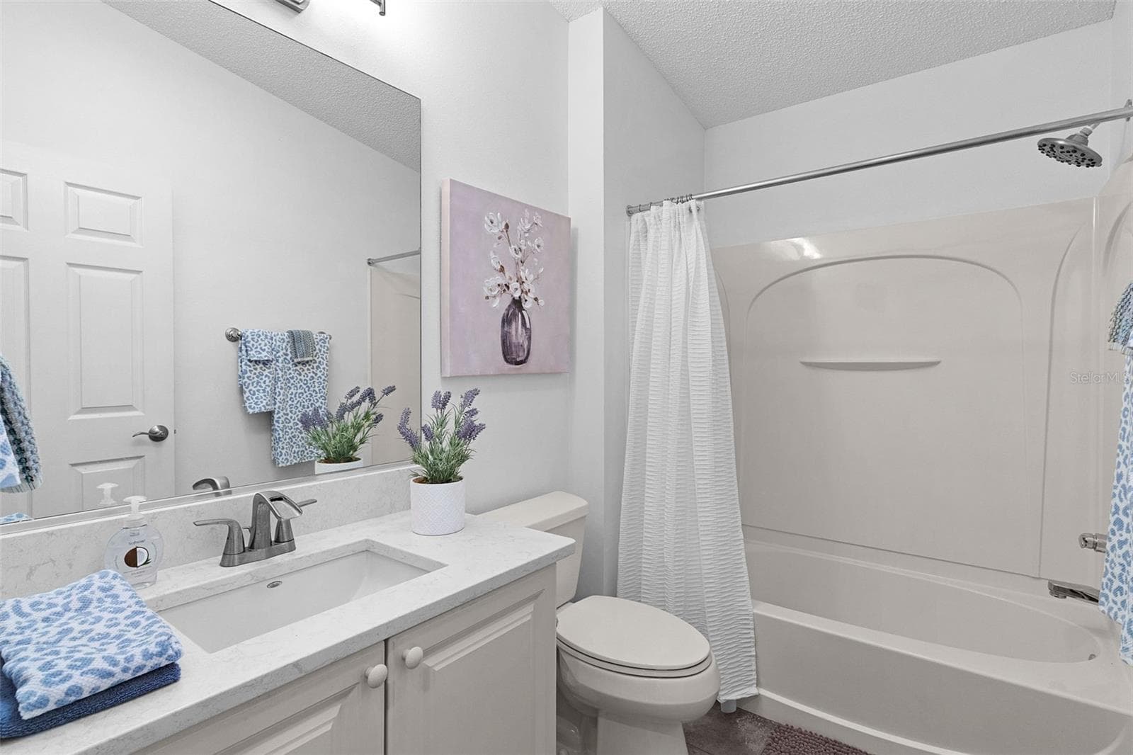 GUEST BATH - QUARTZ COUNTERS! - 313 VARNVILLE WAY, THE VILLAGES
