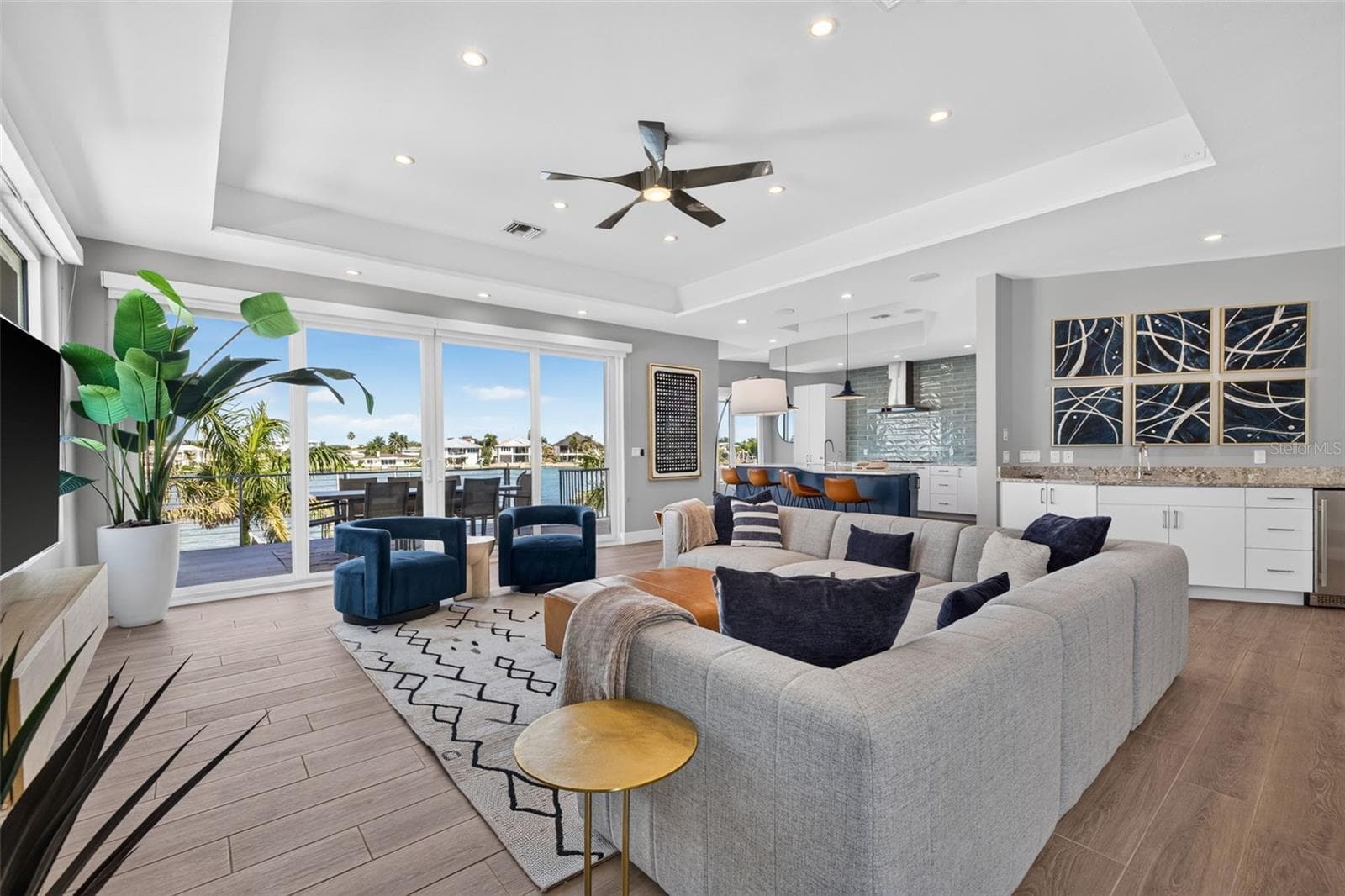 Natural light-filled living space on the open water. - 10209 GULF BLVD, TREASURE ISLAND