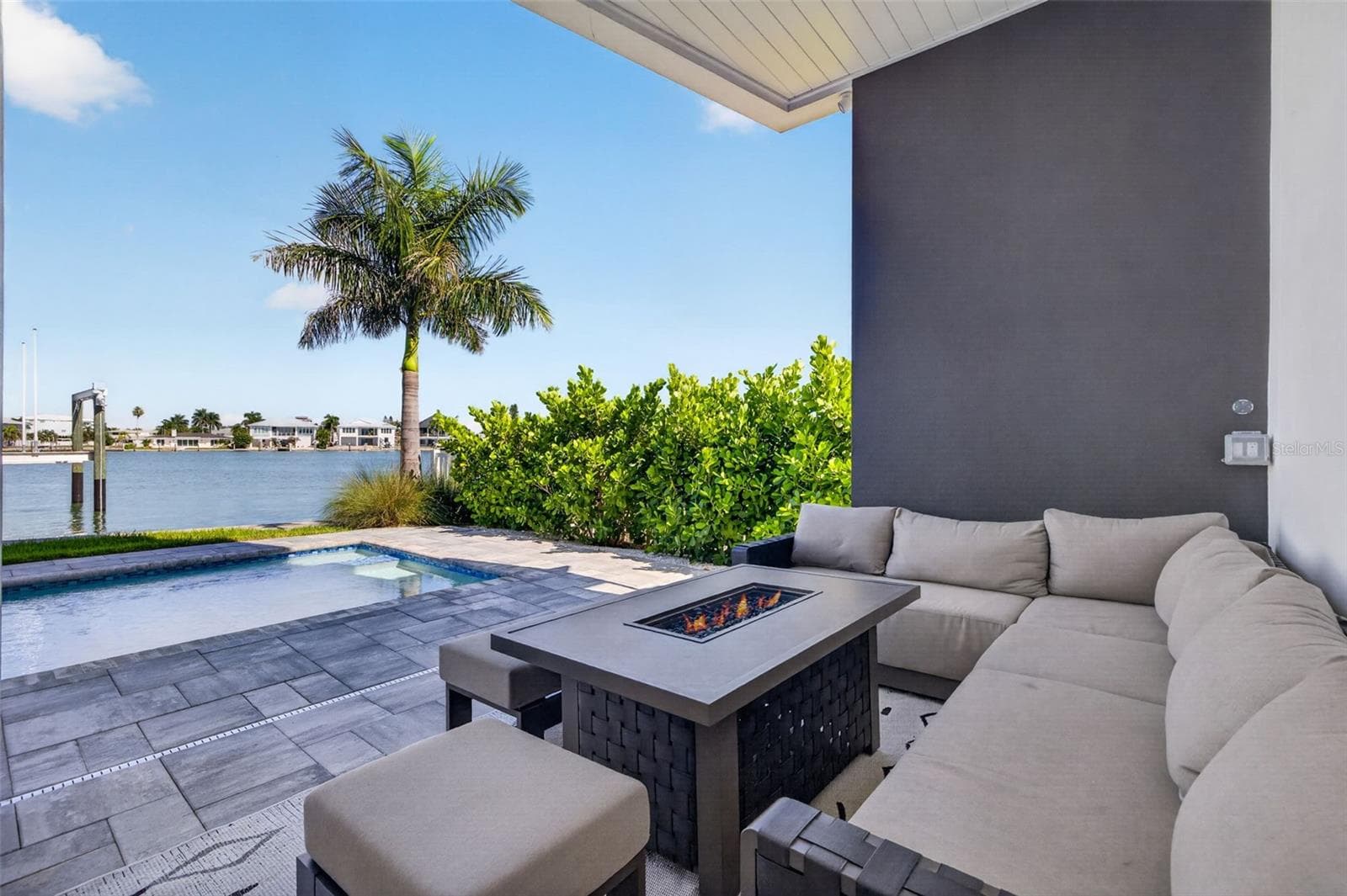 Outdoor seating area. - 10209 GULF BLVD, TREASURE ISLAND