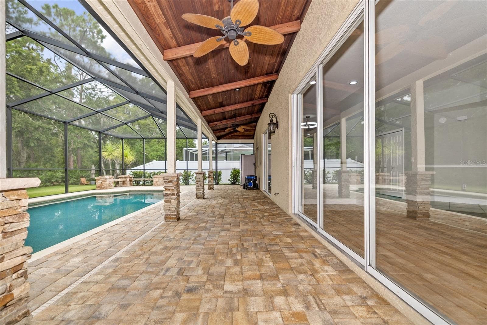Beautiful pavers and tongue and grove ceiling! - 15713 MUIRFIELD DR, ODESSA