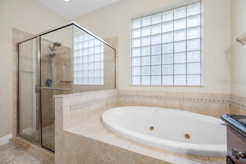 Primary Bath with Jetted Tub & Walk in Shower - 114 IRWIN ST E, SAFETY HARBOR