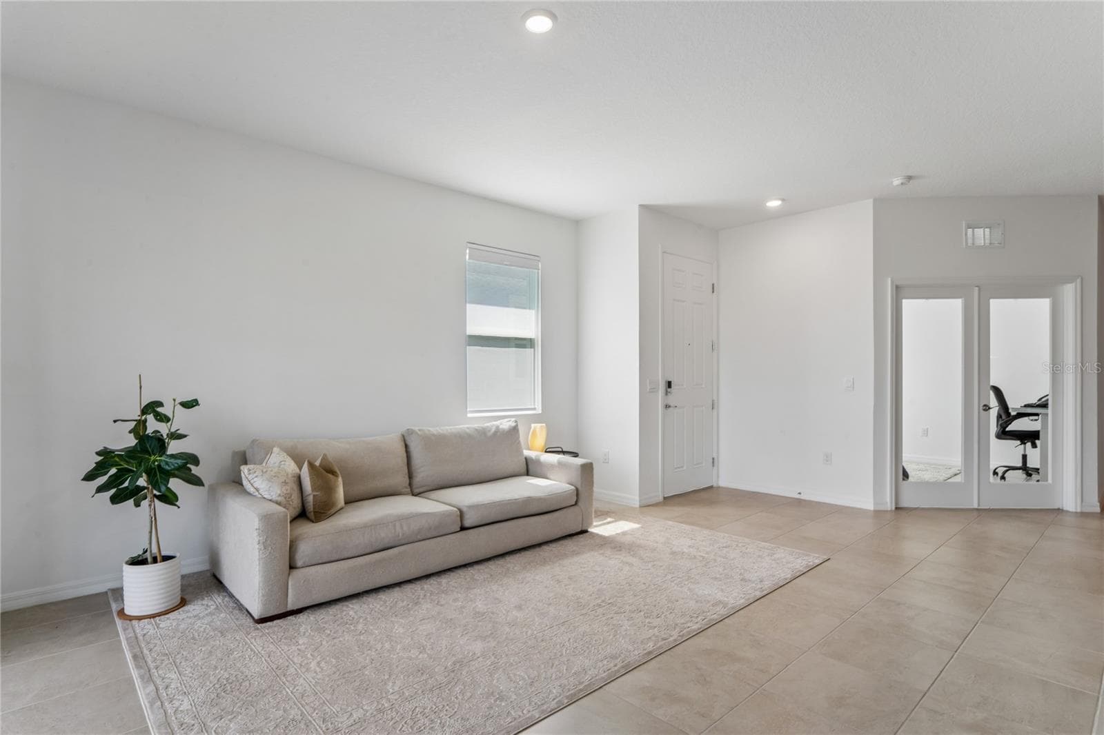 Living room view from Primary - 8580 BOLD CYPRESS LN, WESLEY CHAPEL
