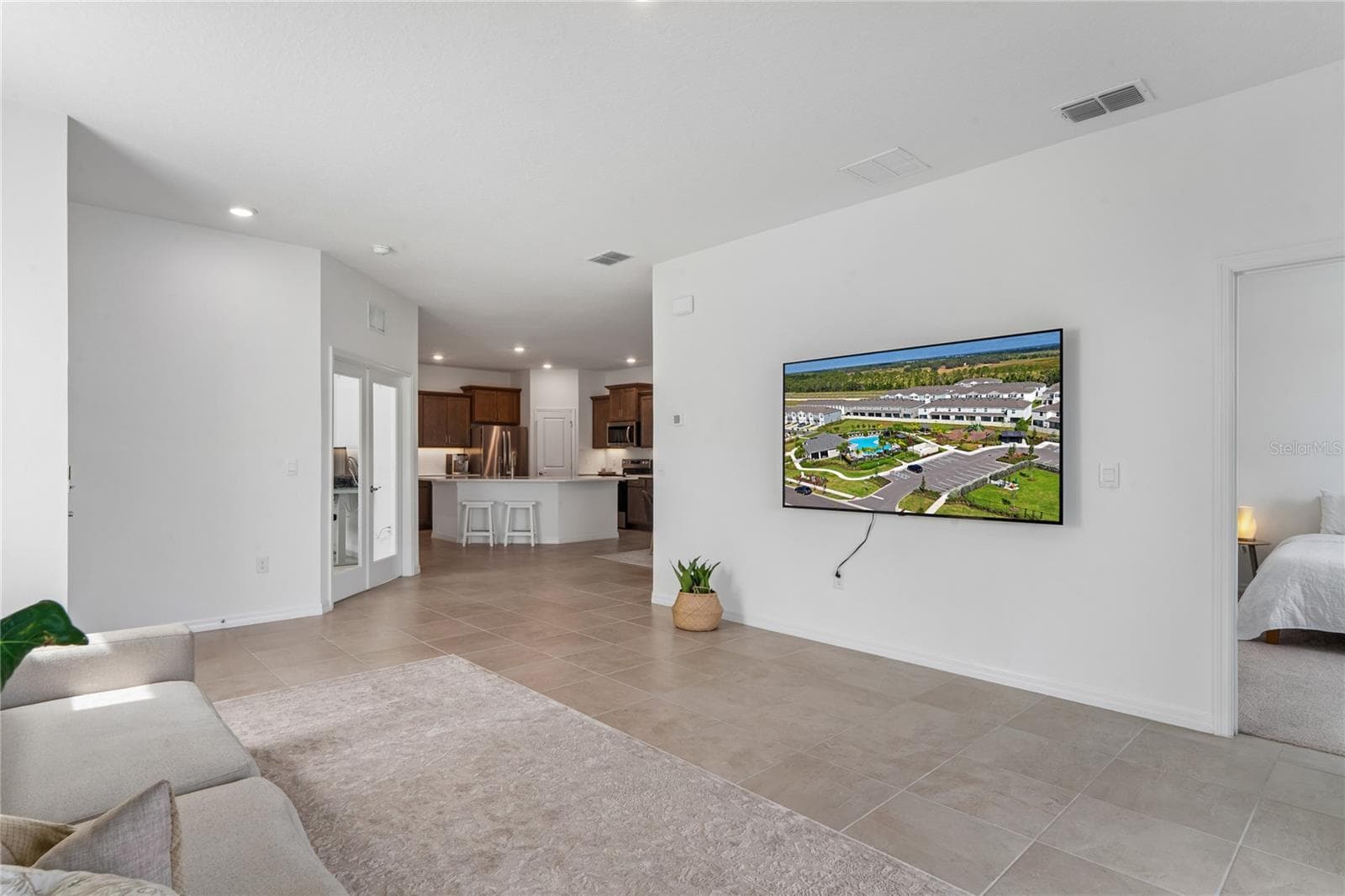 Living room view from glass sliders - 8580 BOLD CYPRESS LN, WESLEY CHAPEL