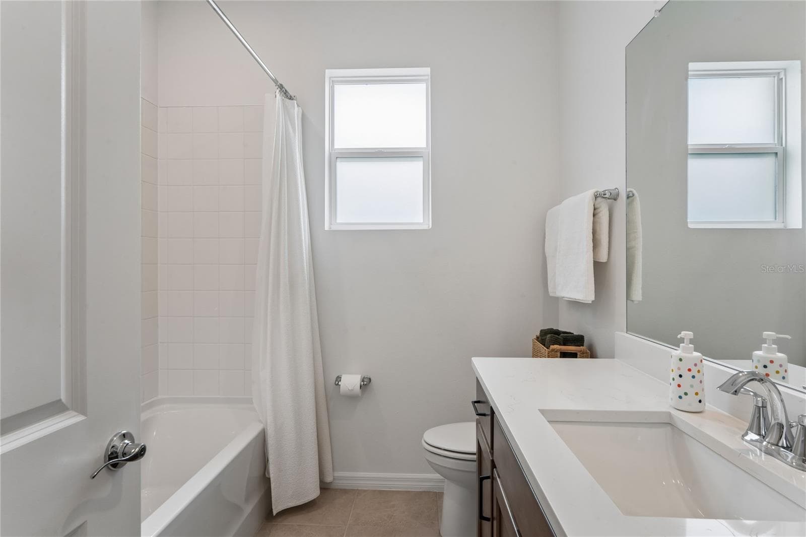 Bathroom 2 Linen closet - 8580 BOLD CYPRESS LN, WESLEY CHAPEL