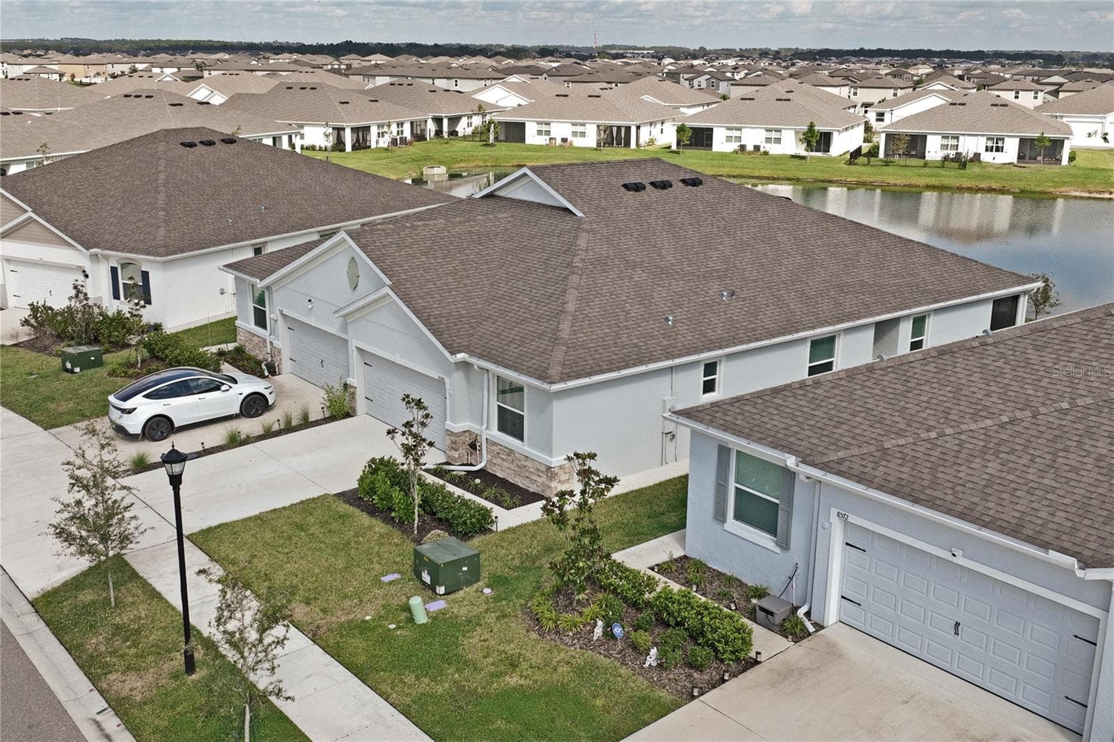 Bird's eye side view of home - 8580 BOLD CYPRESS LN, WESLEY CHAPEL