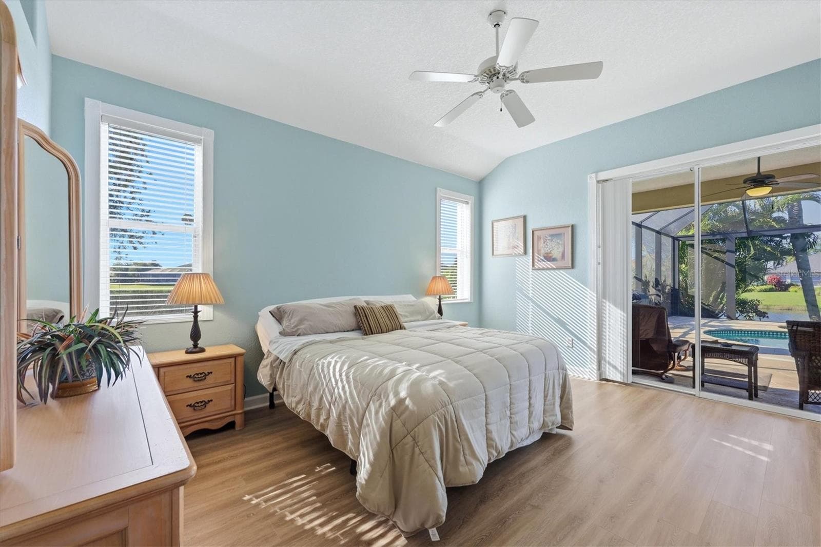 Primary Suite overlooks pool & lake - 3200 BAY RIDGE WAY, PORT CHARLOTTE